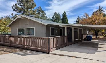 Front of house with carport