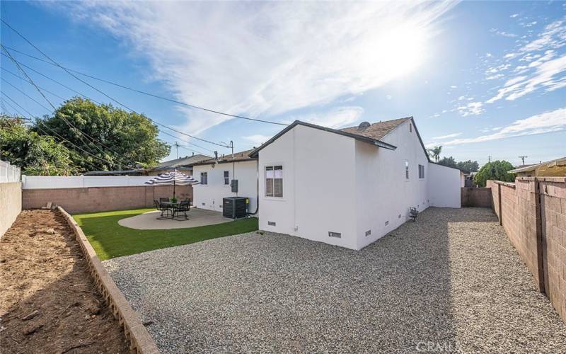 Back yard with garden beds