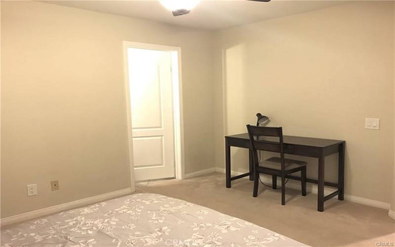 Second bedroom with large desk area