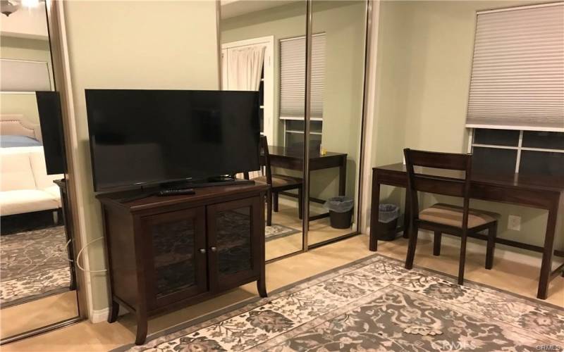 Master bedroom with working desk area
