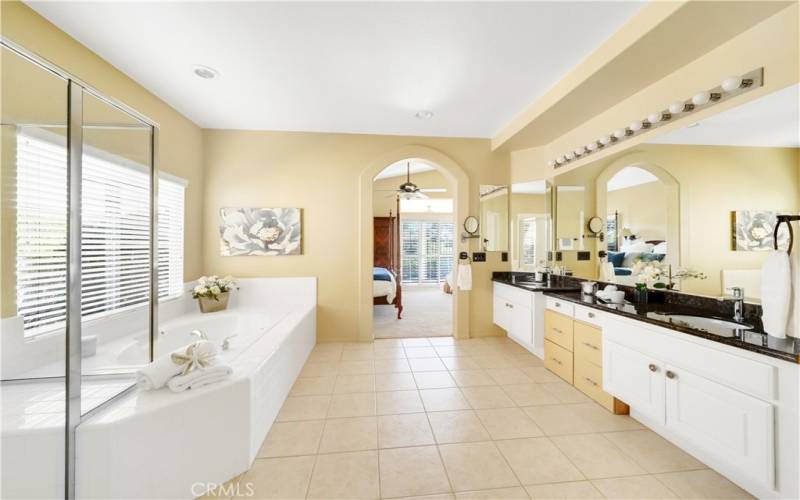 Primary bathroom with separate soaking tub and shower