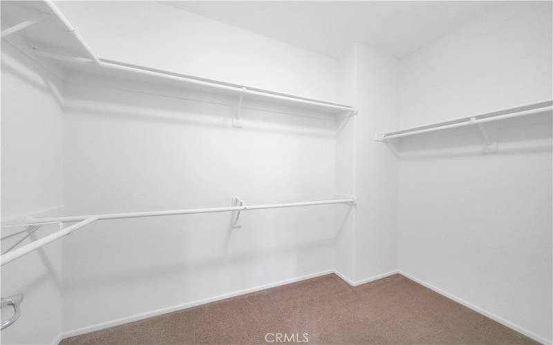 Spacious walk-in closet off the primary bathroom