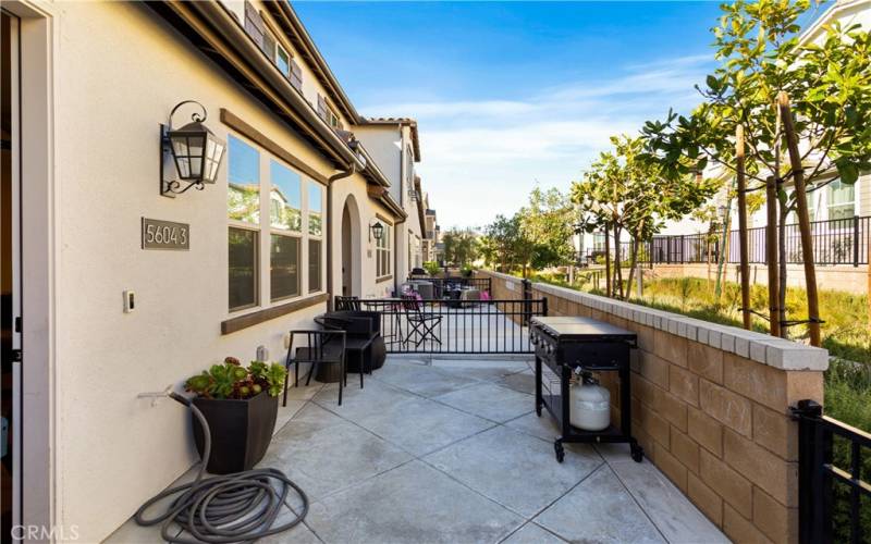 As you enter the home through this quaint patio area you will notice it is a great space for hanging out and barbecuing with your loved ones.