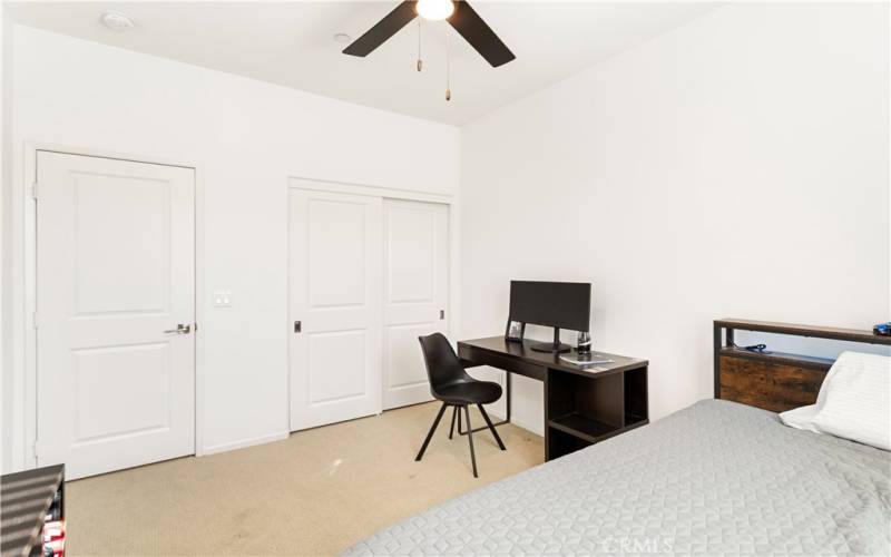 Bedroom #3 has ample closet space and ceiling fan to keep the room cool.