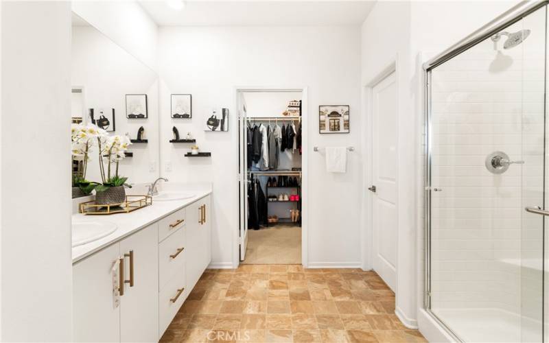 The primary bathroom is beautiful and nicely laid out.