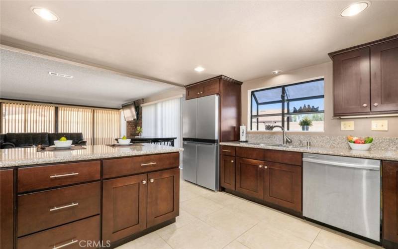 Abundance of nice rich wood cabinetry.