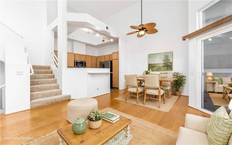 Kitchen with vaulted ceilings is open to the family and dining rooms. (Photo is virtually enhanced with furniture!)