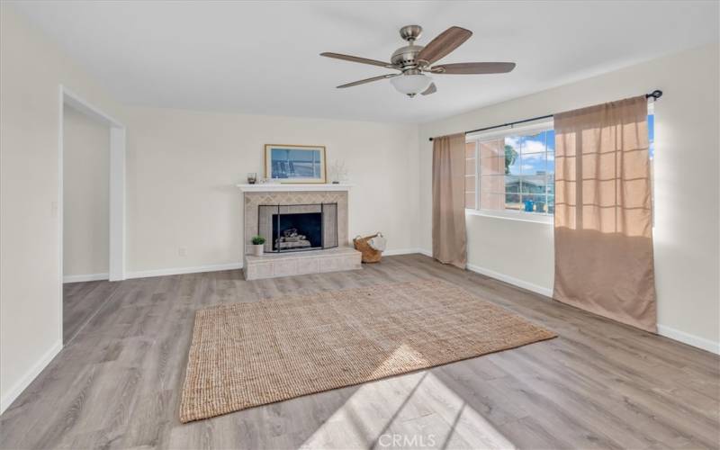 Large Sunny living room with fireplace