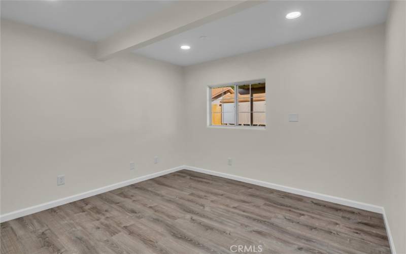 Bedroom at the rear of the home, see floor plan picture for measurements.  Closet is the the left of this photo.