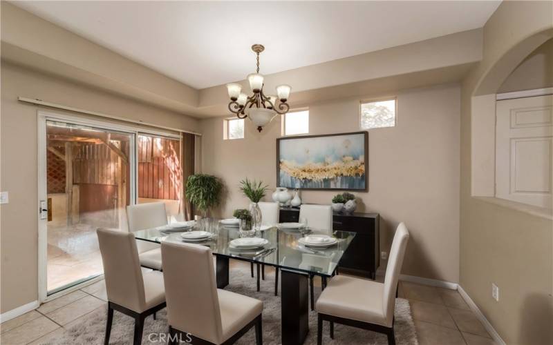 Dining room has been virtually staged