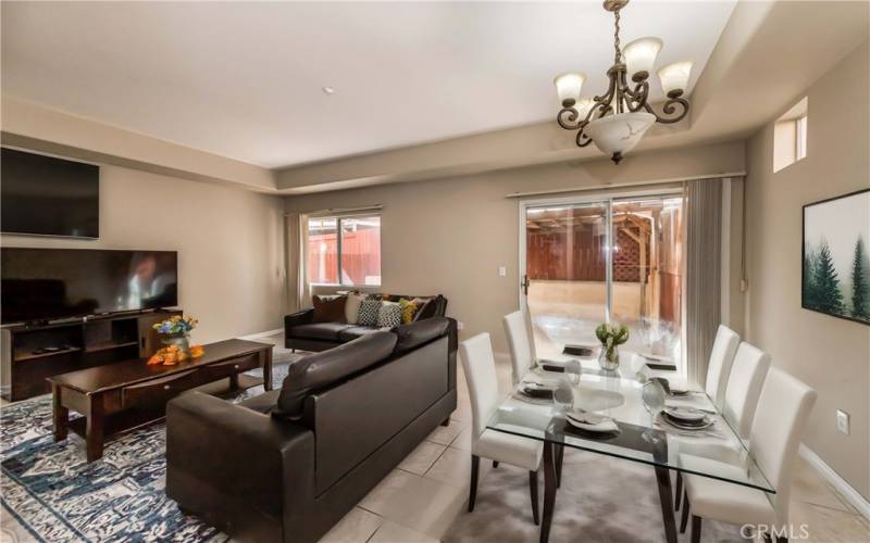 Dining room has been virtually staged