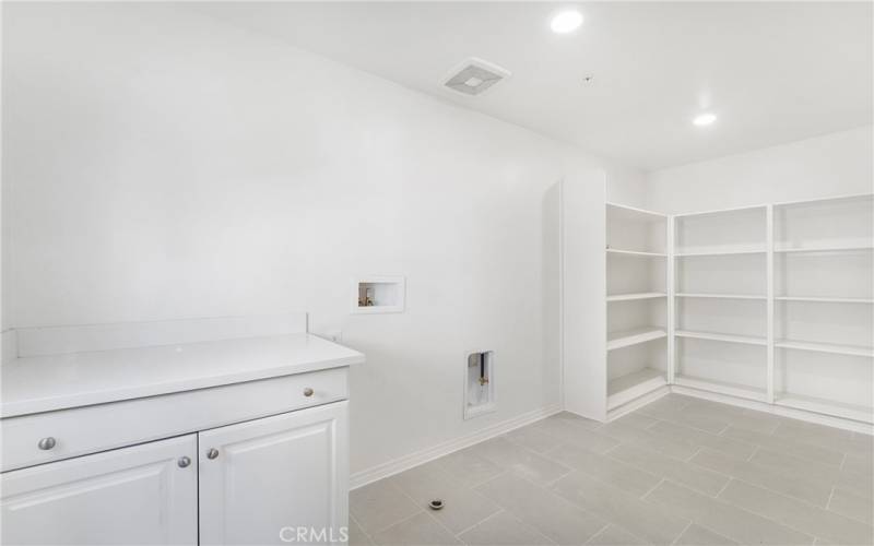 Spacious, highly functional UPSTAIRS laundry room!