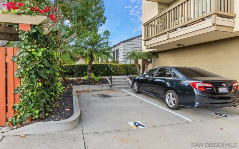 Dedicated parking space - no steps if you take walkway from the  sidewalk to the front entry gate