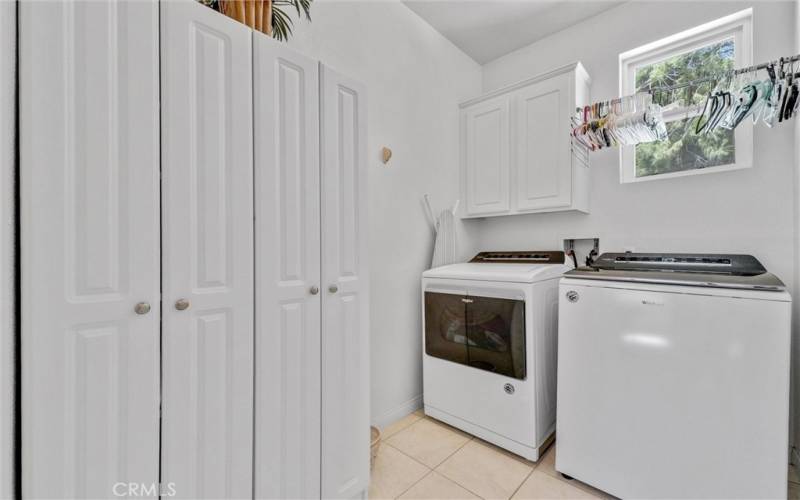 Spacious Laundry Room with plenty of storage space.