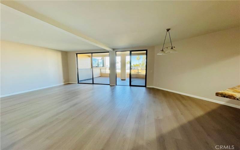 Living Room with Double Sliding Doors and New Flooring