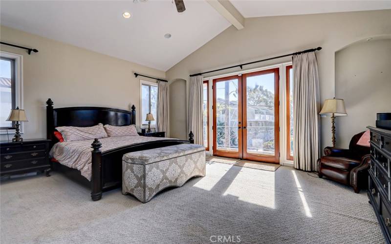 Luxurious primary suite with fireplace and balcony!