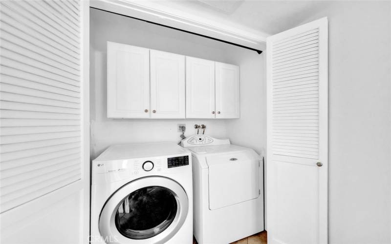 Washer and dryer inside the residence.