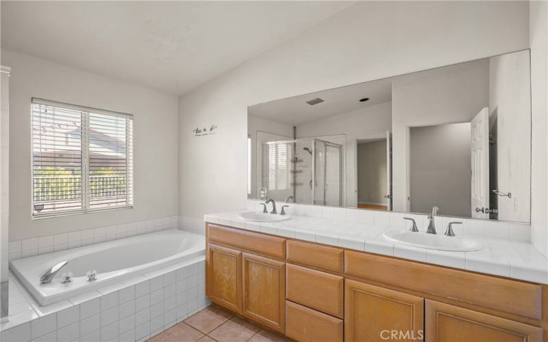 Primary bath with dual sinks, separate tub & shower