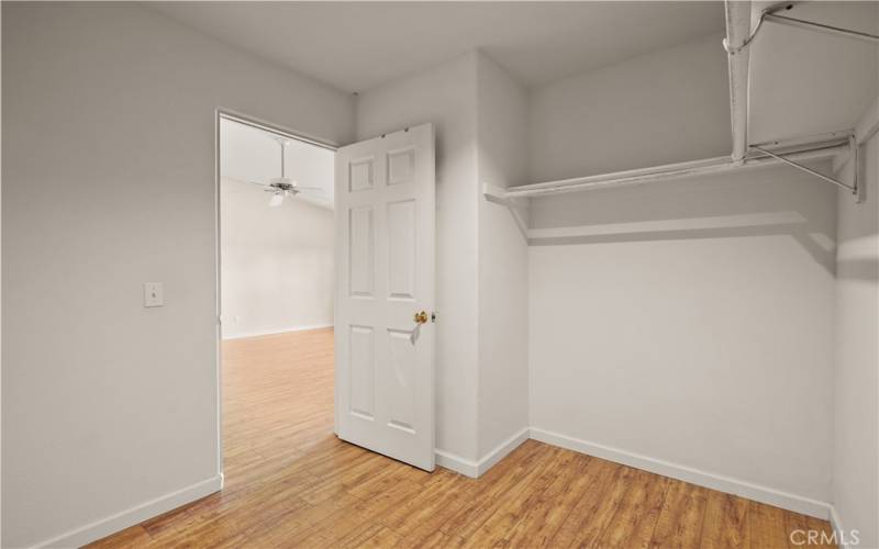 Huge walk in closet in primary bedroom