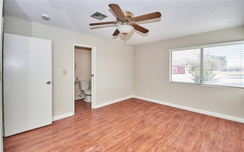 Master bedroom with a bathroom