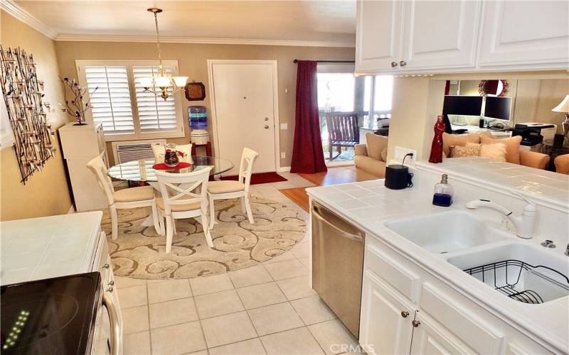 Kitchen toward Dining, Living Area, and Balcony