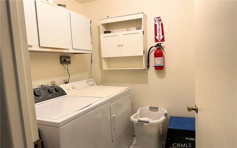 Laundry room in converted garage