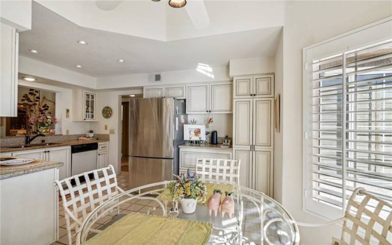 Upgraded cabinetry in the kitchen and granite countertops.