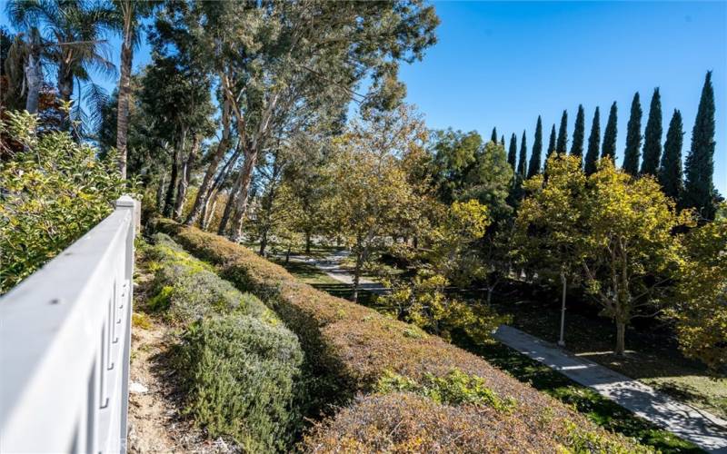 The house backs up to a community walking trail below.  The trail sits way lower than the home does.