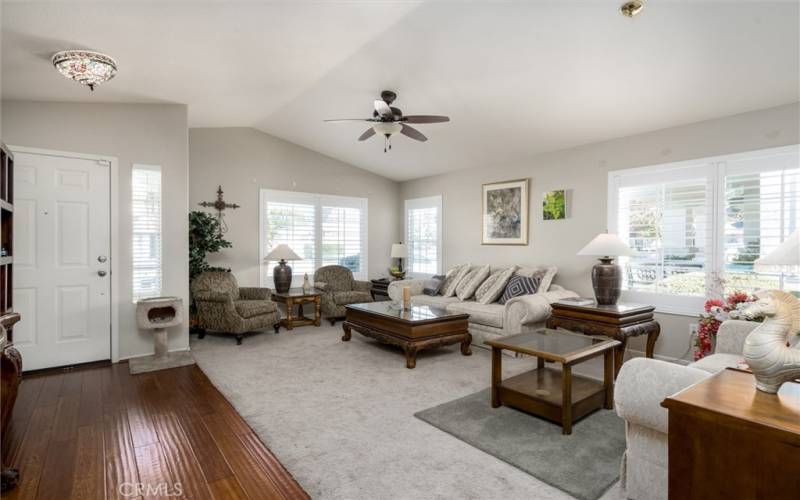 The living room, facing the front door.