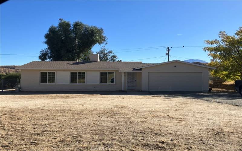 Huge front yard with 2 car attached garage