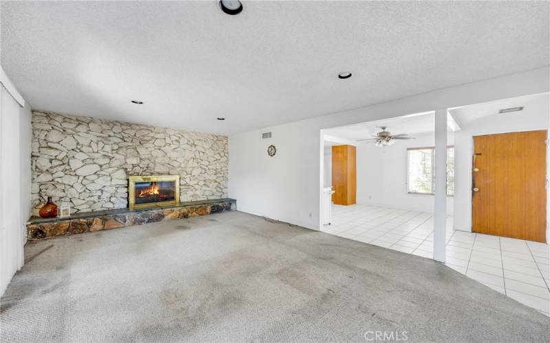 living room with cozy fireplace