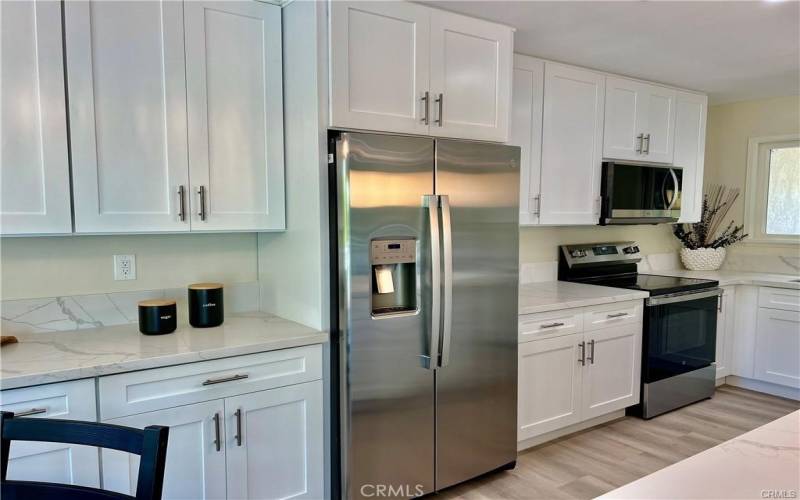 Remodeled kitchen with stainless steel appliances