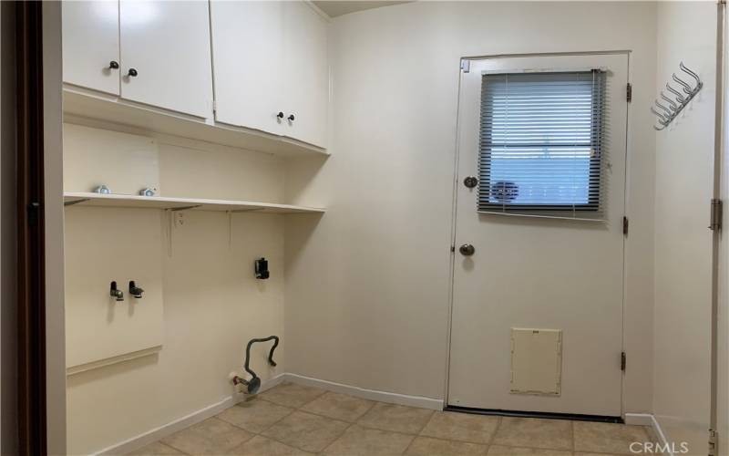 Laundry room with washer and dryer hookups