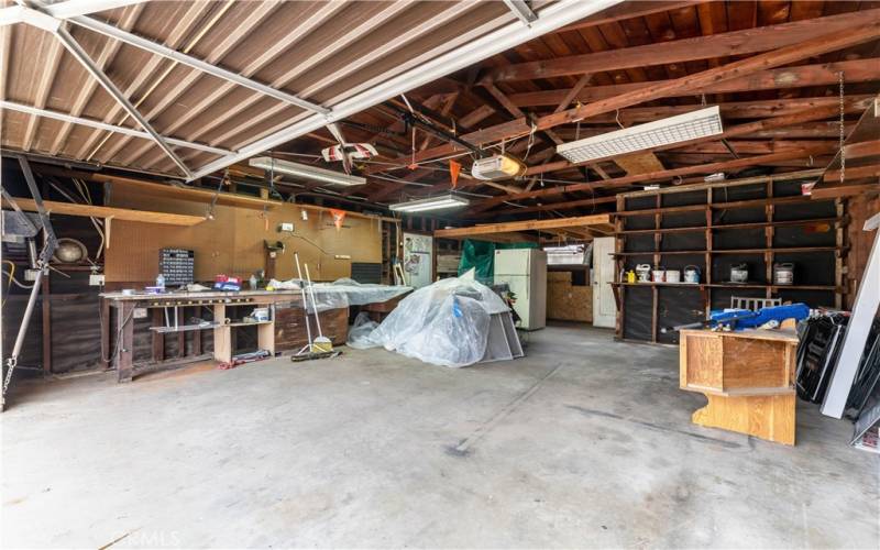 Larger than average 2 car garage with workshop area and bonus room