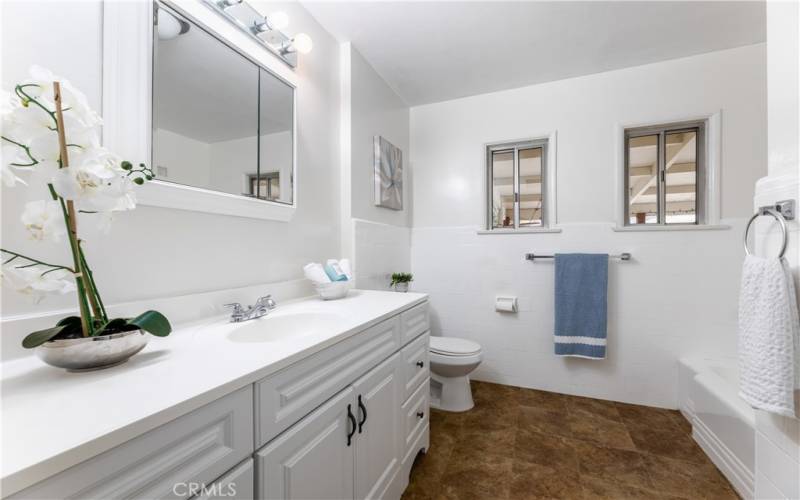 Large bathroom with bath and separate shower