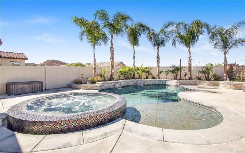 Amazing oversized spa with beautiful glass tiles