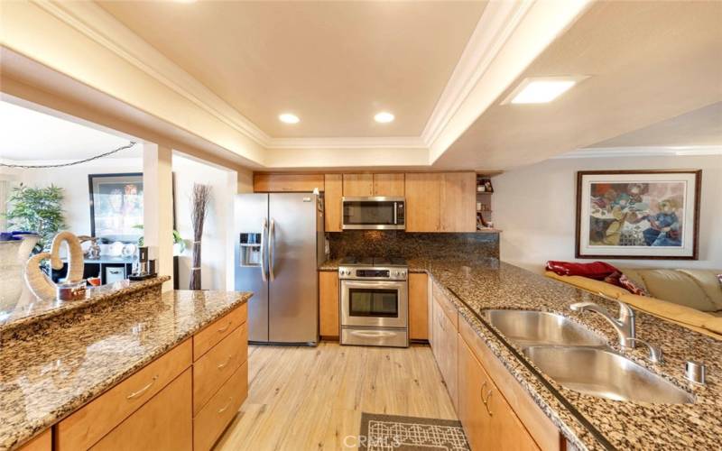 Beautiful kitchen with stainless steel appliances. It is open to all living spaces making it a great home to entertain.