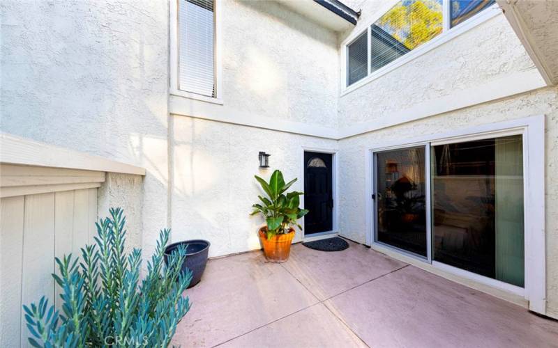 Gated private entry courtyard.