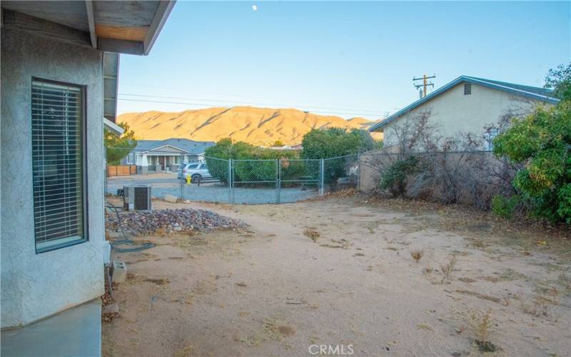 Side yard with double gate for RV parking