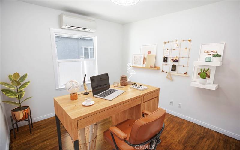 Bedroom virtually staged as office