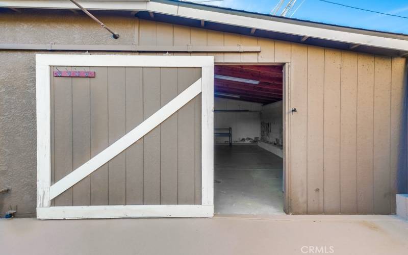 Bonus storage room behind garage