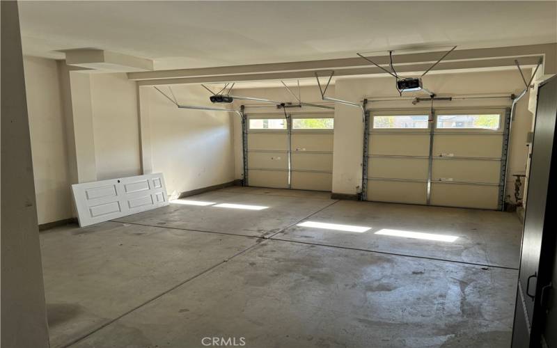 DOUBLE GARAGE DOORS WITH 2 GARAGE DOOR OPENERS