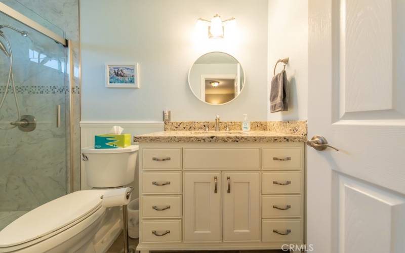 Downstairs bathroom with 42 in white Maple Vanity