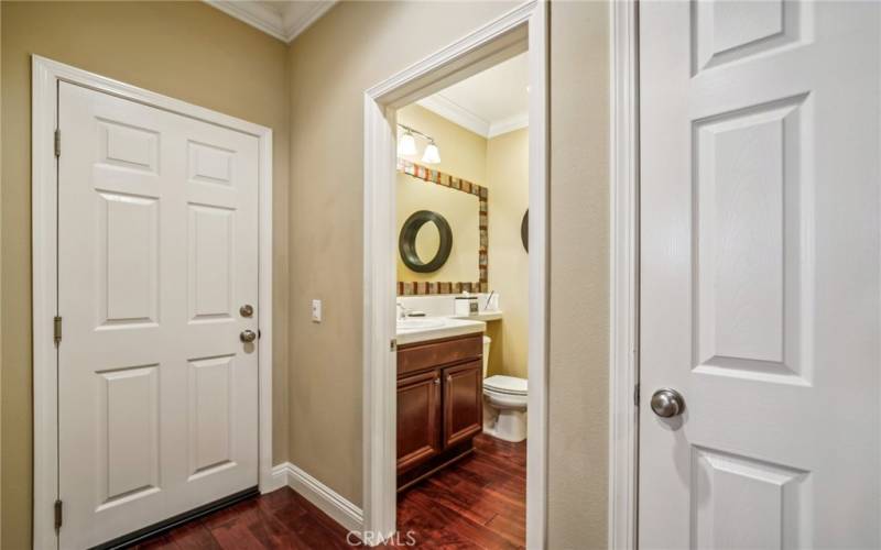 Hallway to Garage & Downstairs Bath