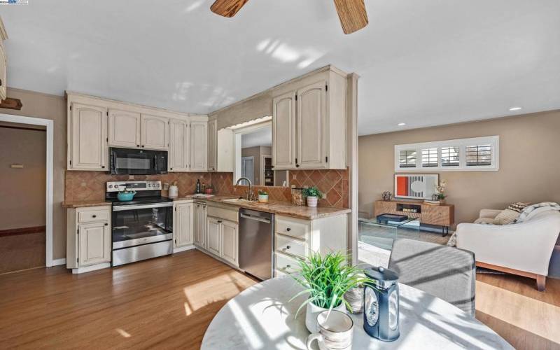 The kitchen flows nicely into the relaxing family room, great for entertaining and everyday living.