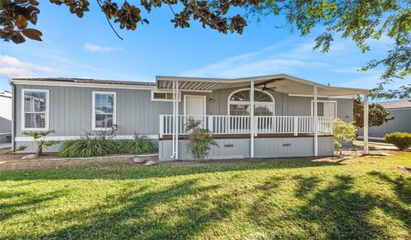 Front w/ spacious covered porch