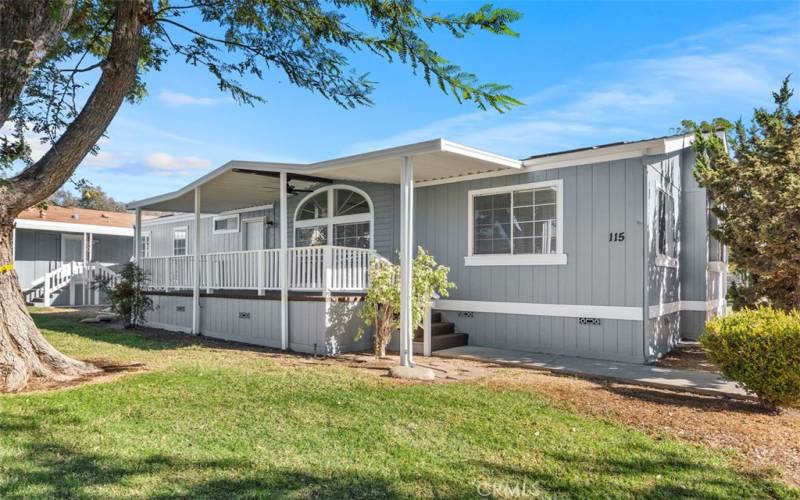 Front w/ spacious covered porch