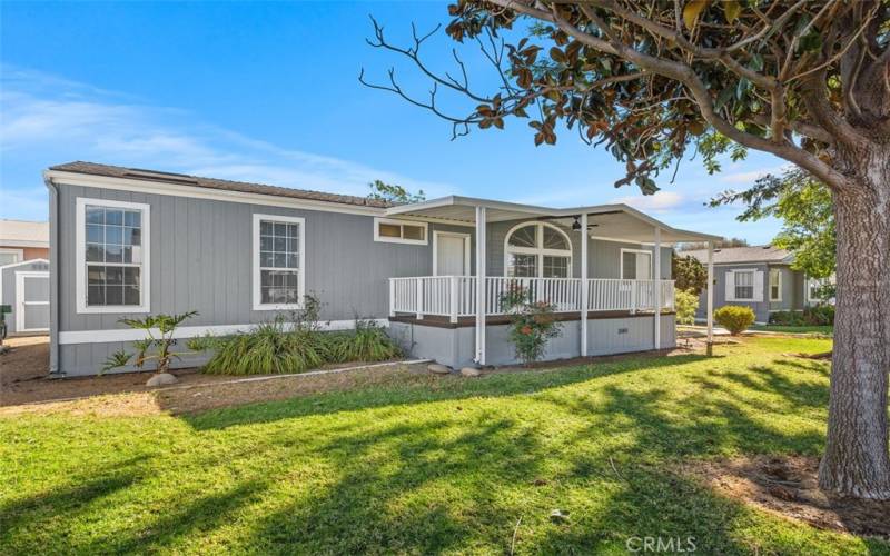 Front w/ spacious covered porch