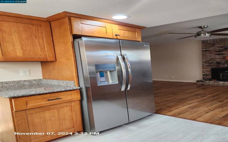 Brand new stainless steel appliance package includes a counter depth refrigerator.