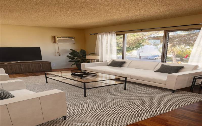 Living Room with large picture windows - virtually staged